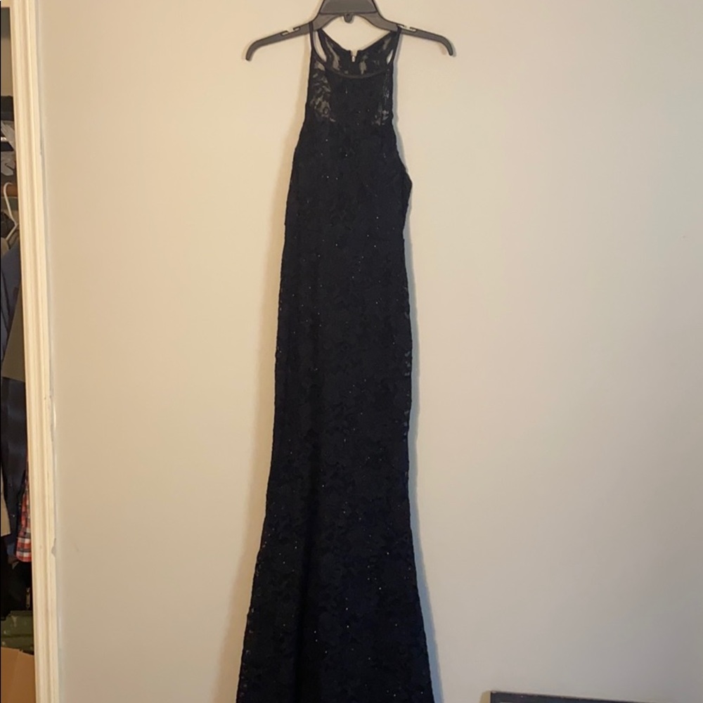 Lace black cocktail dress. Flare bottom